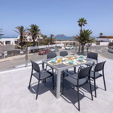 2 Beachfront By Holidays Apartment *